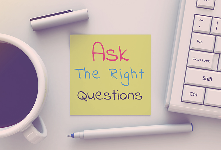 Ask The Right Questions, message on note paper, computer and cof